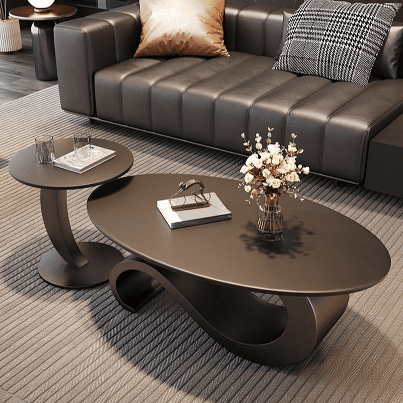 Minimalist Elliptical Rock Nesting Accent Table with Abstract Base - image 3