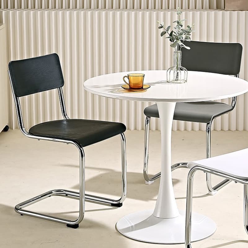 Cantilever Stable Armless Chair with Foot Pads, Open Back and Metal Base in a Modern Style - image 8