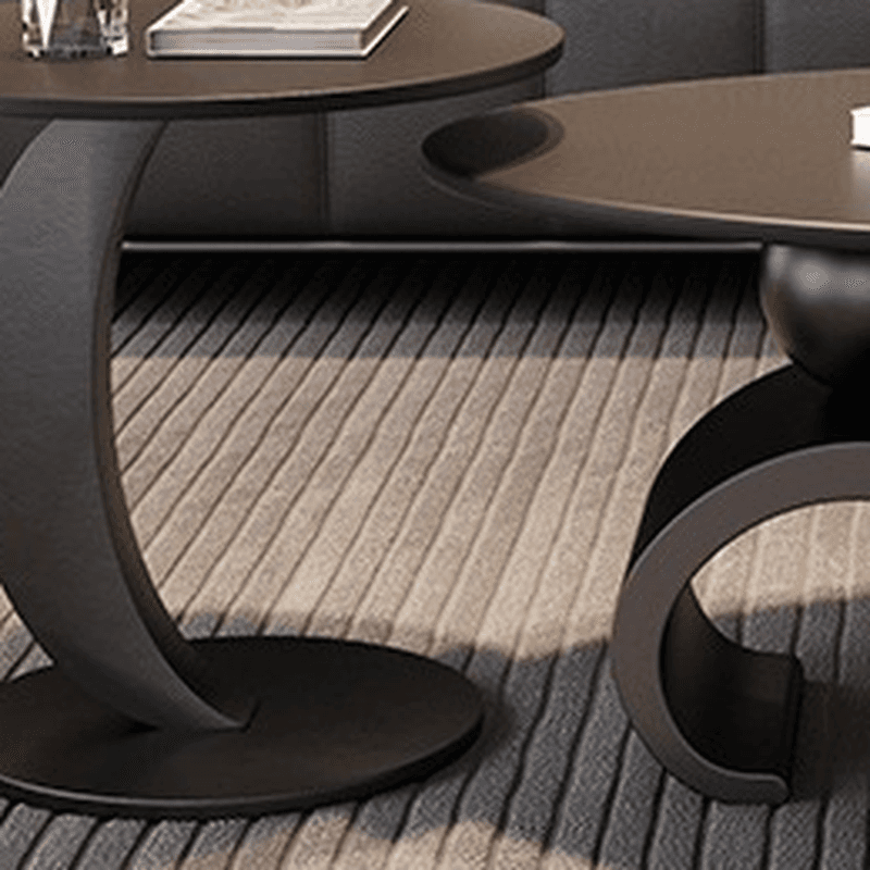 Minimalist Elliptical Rock Nesting Accent Table with Abstract Base - image 8