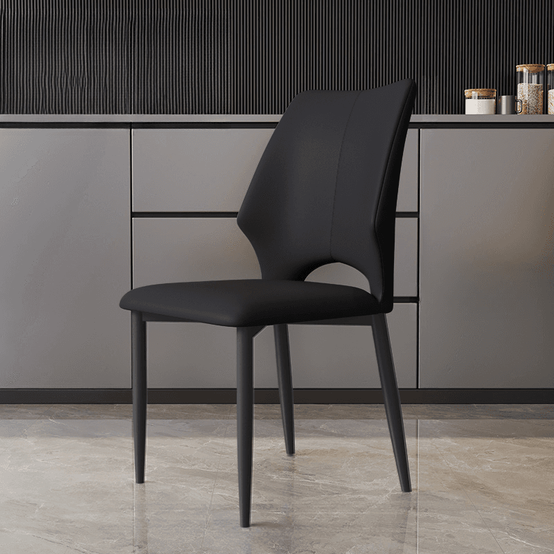 Trendy Winged-back Side Chair in Pu Leather with Midnight Black Alloy Legs, Secure and Stylish