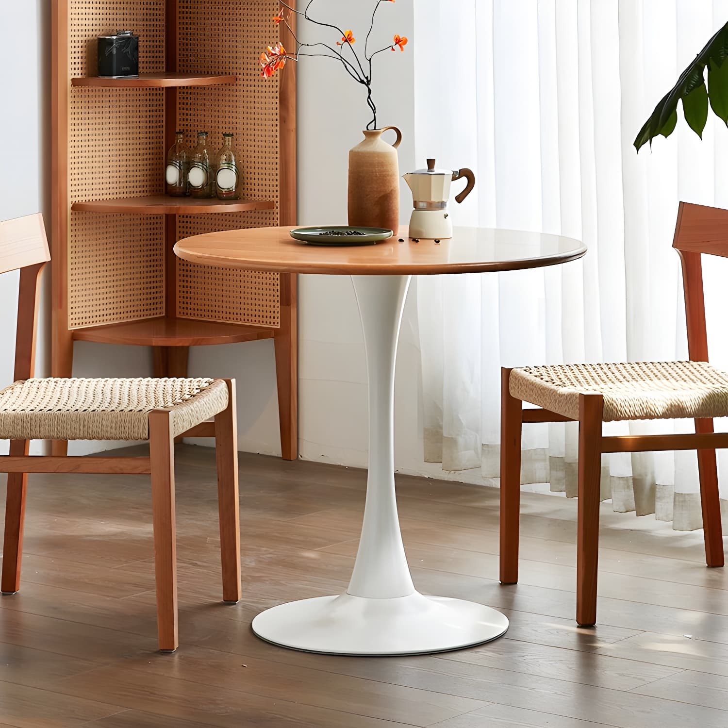 Chic Round Wood Dining Table with Medium Wood Tone and Sleek Steel Tulip Base - image 5
