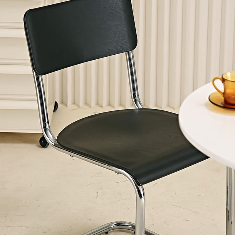 Cantilever Stable Armless Chair with Foot Pads, Open Back and Metal Base in a Modern Style - image 15