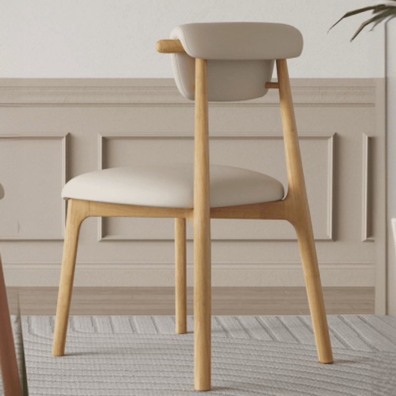 Casual Side Chair in Vinyl Leather with Wood Legs, Low Back, Framed and Balanced - image 9