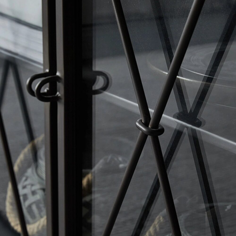 closeup_geometric_xframe_glass_door.jpg Black metal sideboard with