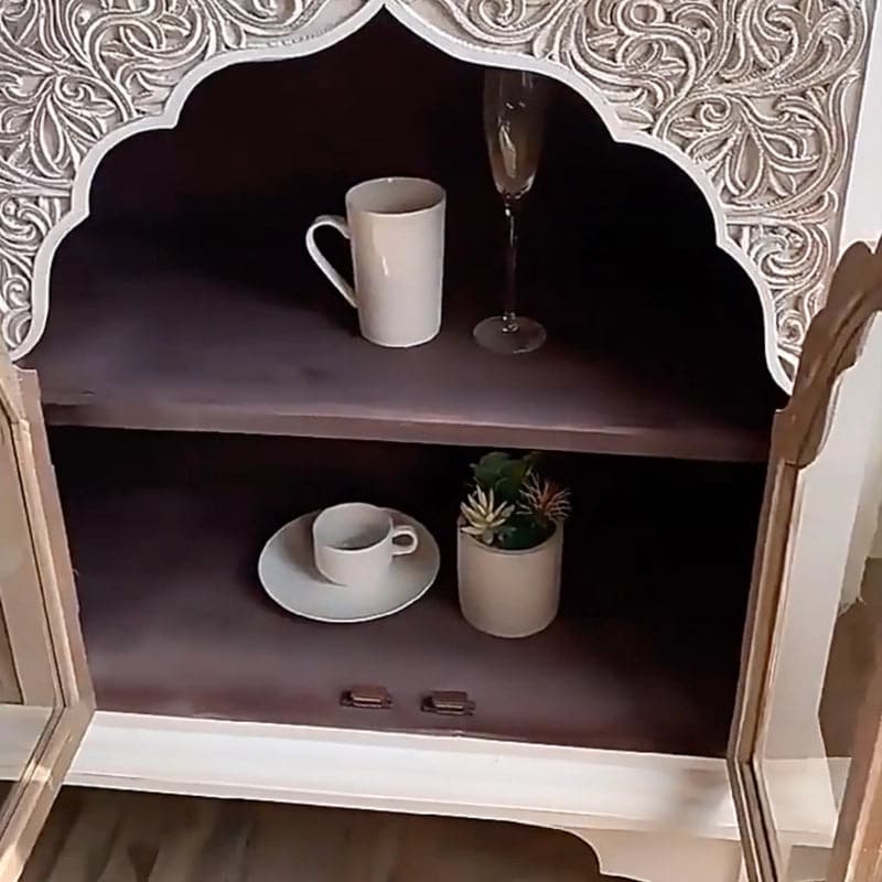 interior_view_carved_wood_sideboard_cups_plant_decor.jpg Boho carved fir wood