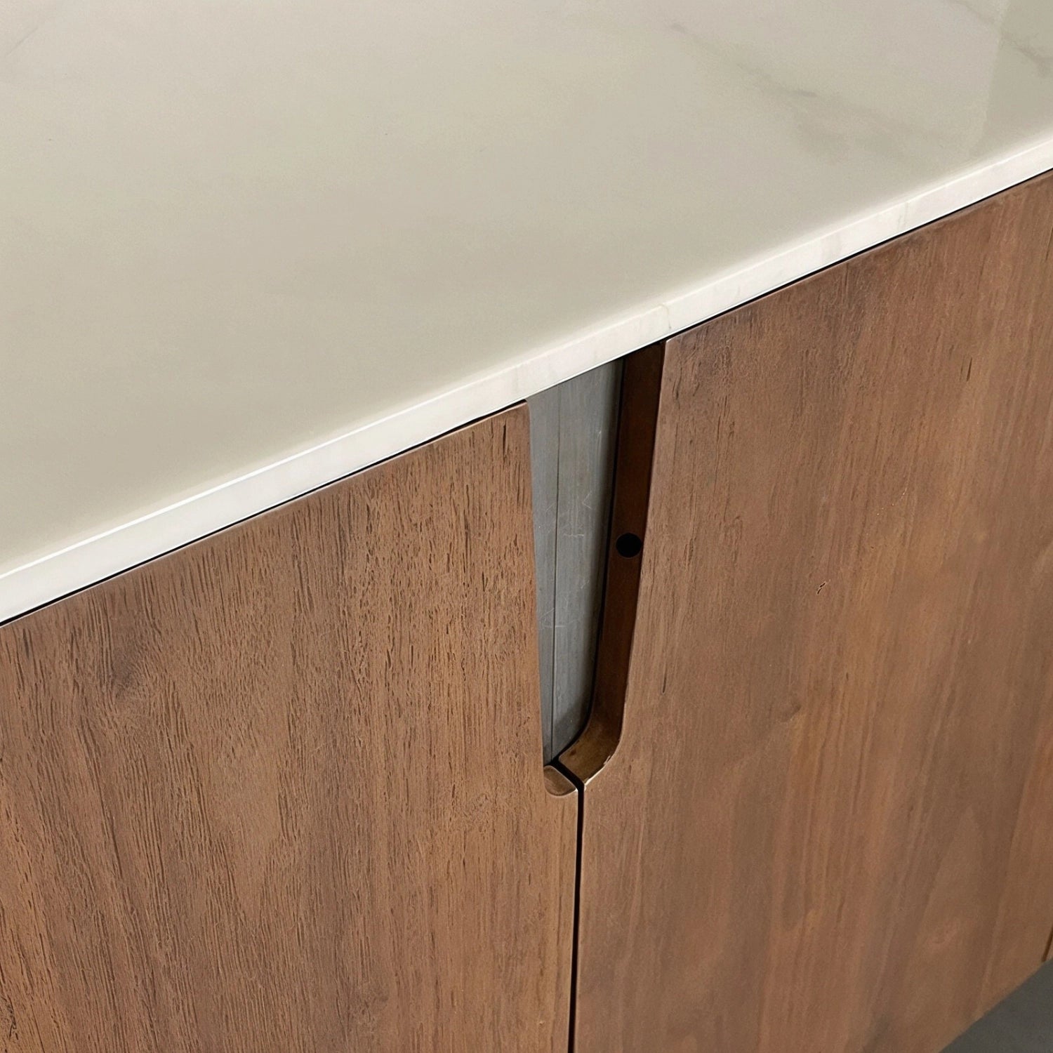 marble_top_stainless_handle_modern_oval_sideboard.jpg Modern oval