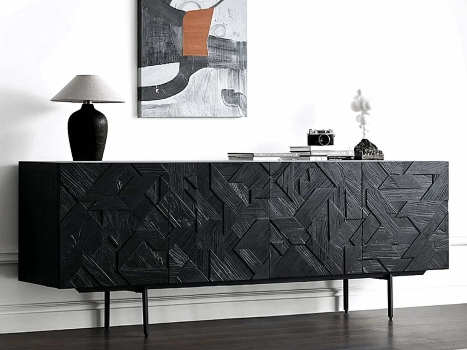 modern_black_sideboard_with_hand_carved_geometric_teak_doors_in_living_room.jpg Modern black sideboard with hand