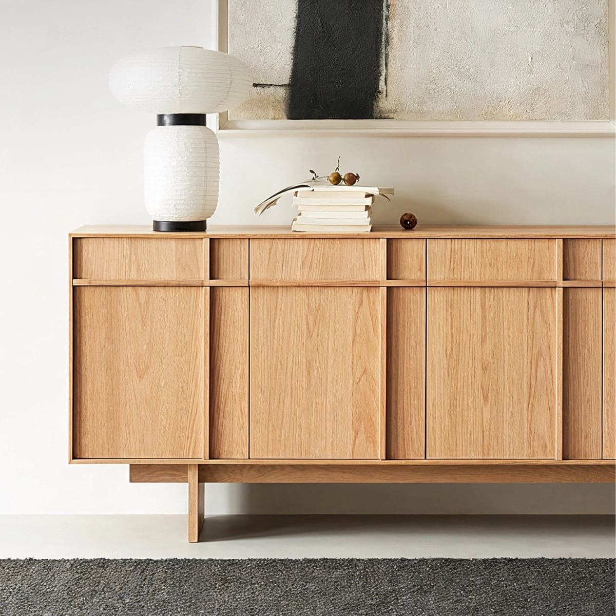 modern_oak_buffet_sculptural_white_lamp_books_geometric_cabinet.jpg Modern white oak sideboard