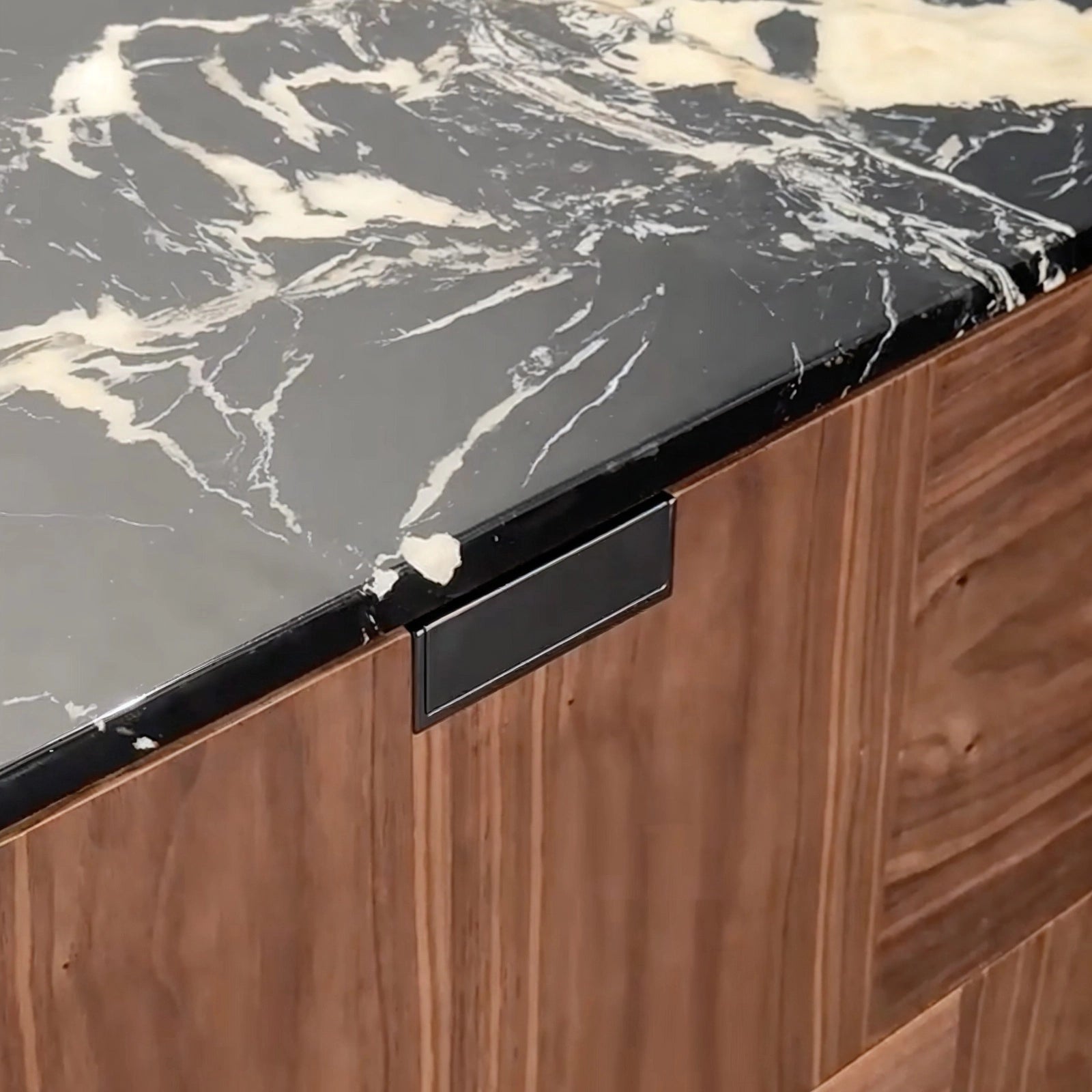 natural_black_white_marble_tabletop_detail_rounded_sideboard.jpg Detail of a natural