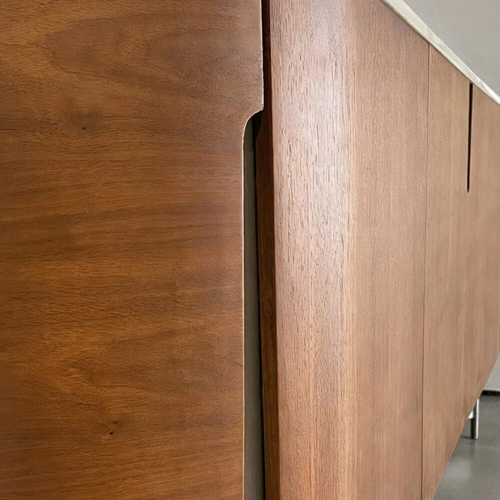 walnut_veneer_door_cutout_handle_oval_sideboard.jpg Walnut veneer oval sideboard