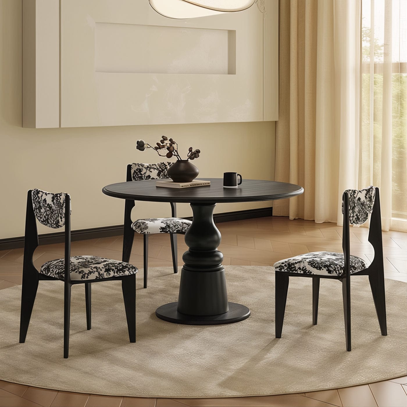 Hb0d87c033b8e415d89579a48e73088d2e_LE_upscale_balanced_x2_e387983f-f525-416c-88bb-7ff0b781deab.jpg Black round dining table