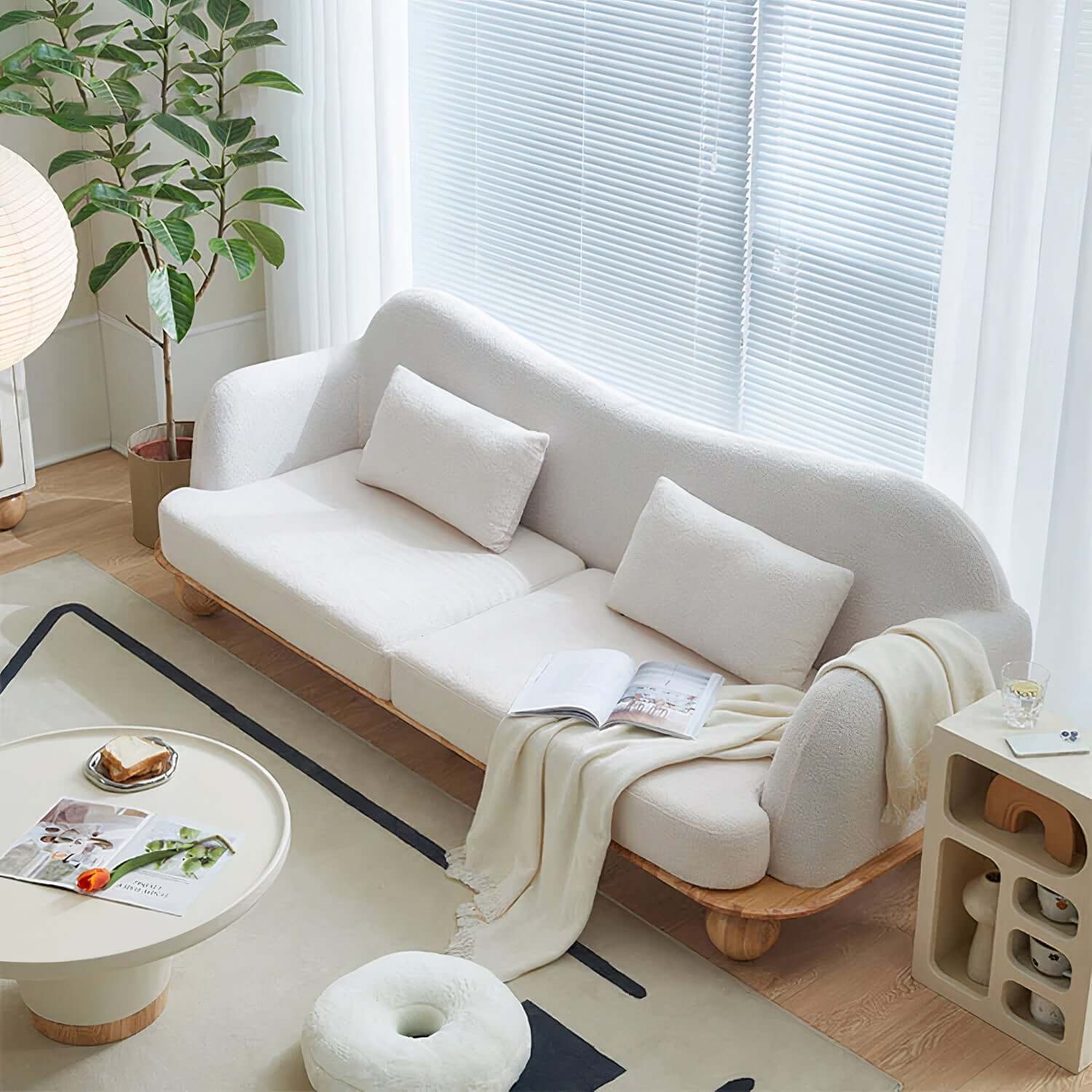 products-H2d8370a357514540ba300df270717b31O_750x750_auto_x2_2bbce89f-883f-432f-a33a-a5f890b3d6e8.jpg Daisy boucle sofa with sleek