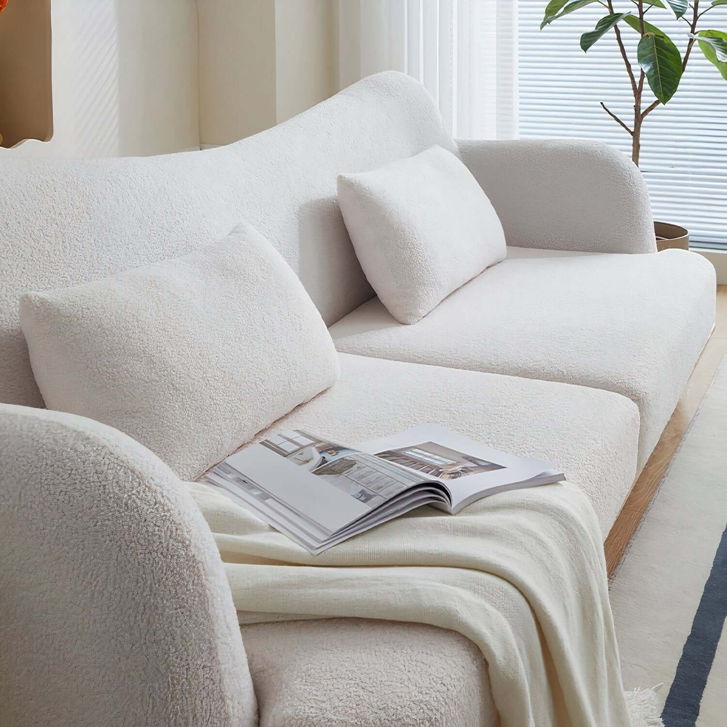 products-Heaee6e1d851743358846260ee3fecbaf0_750x750_auto_x2_918eded7-02ab-4513-a11c-288200e81238.jpg Daisy boucle sofa with ash