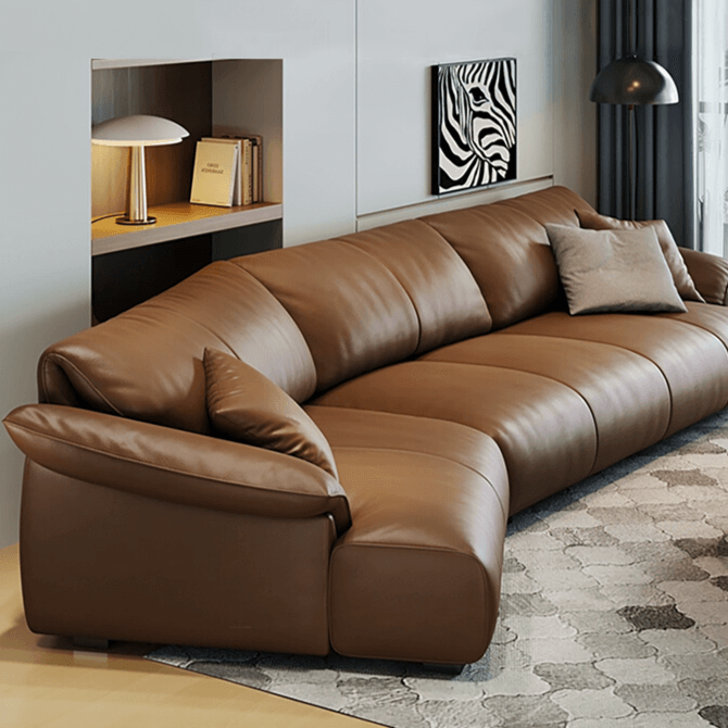 Brown leather curved sofa