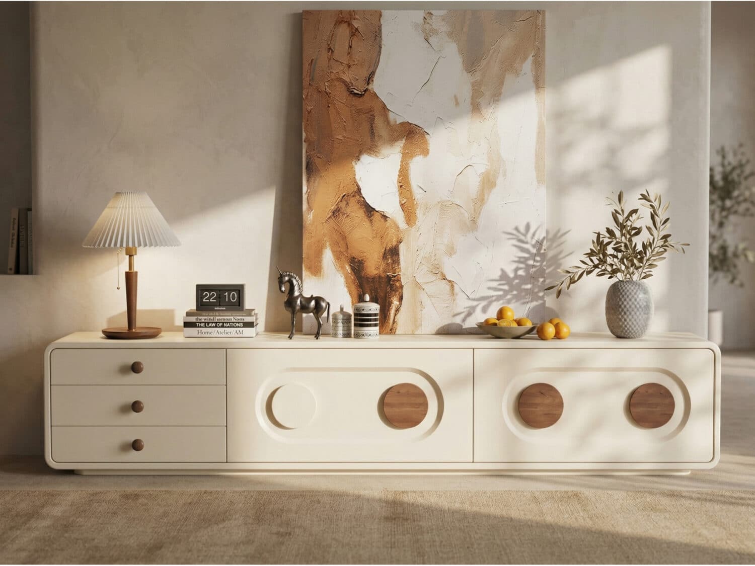 Modern minimalist cream TV stand with warm wood accents and rounded edges in a contemporary living room.